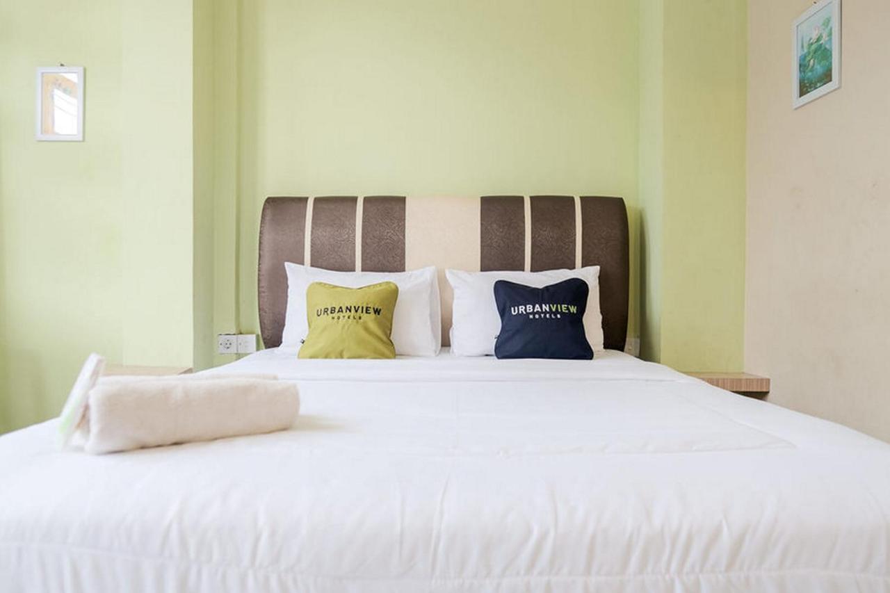 Urbanview Hotel Ta Ke Jelutung Puncak Jambi Exterior photo