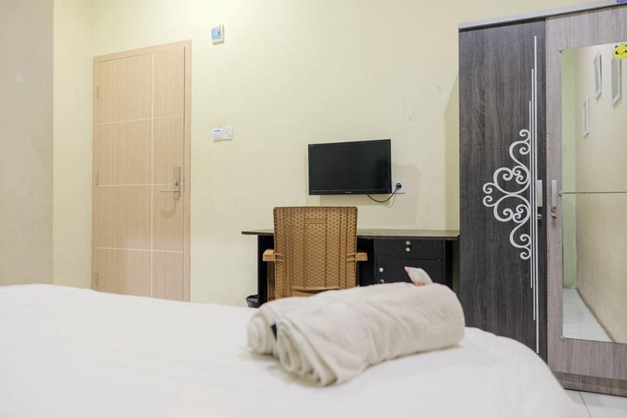 Urbanview Hotel Ta Ke Jelutung Puncak Jambi Exterior photo