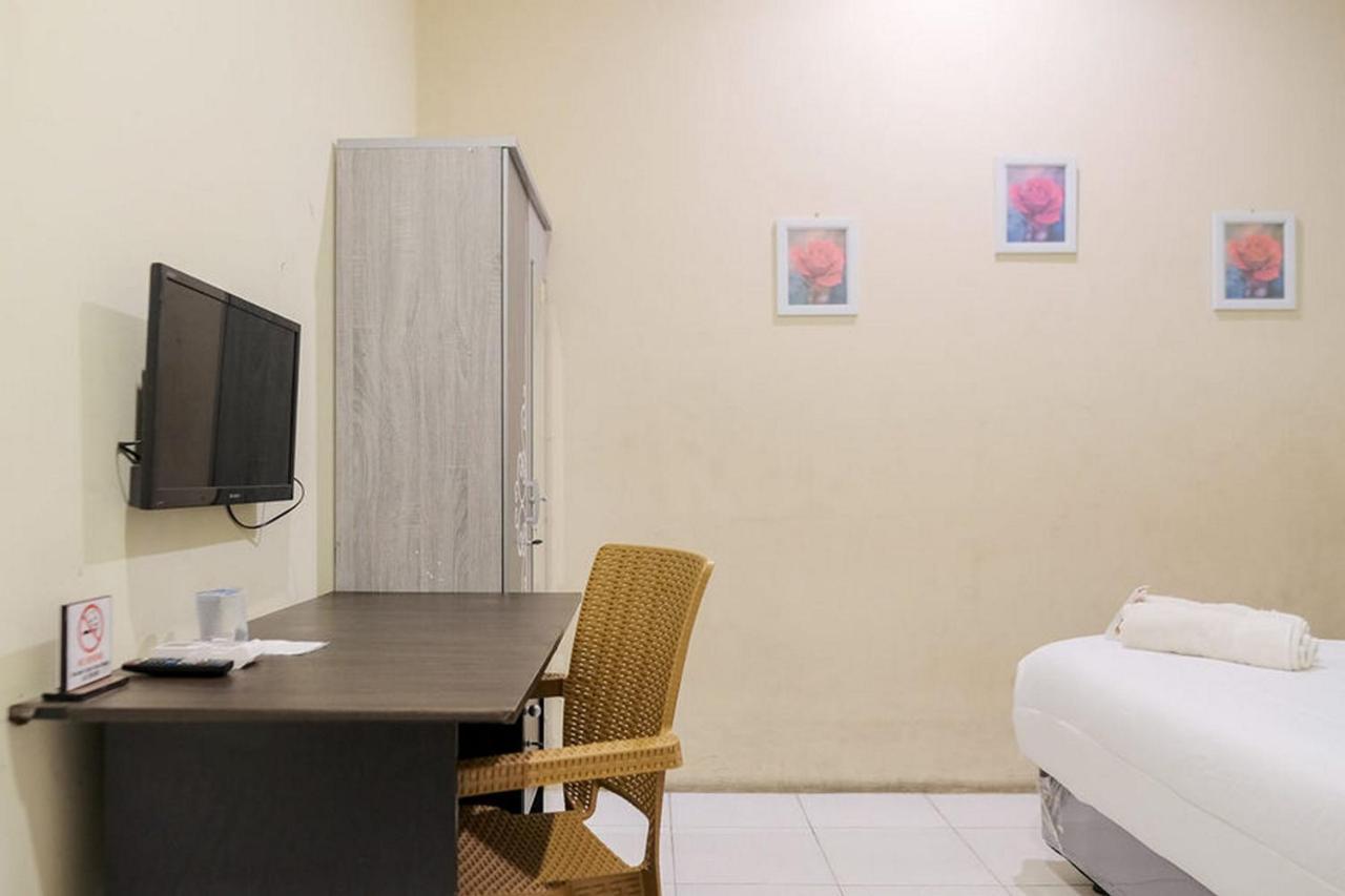 Urbanview Hotel Ta Ke Jelutung Puncak Jambi Exterior photo